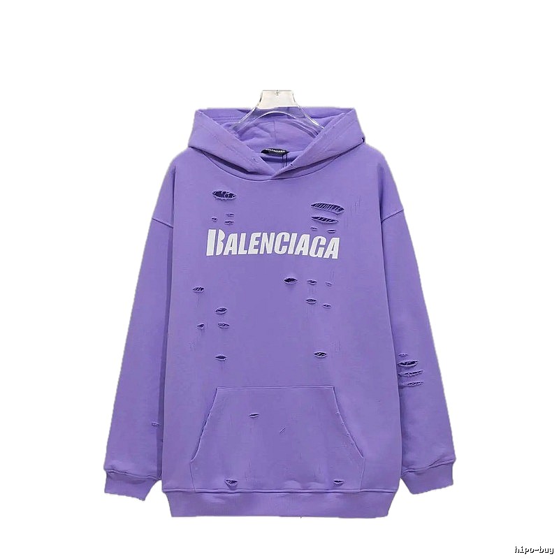 Balenciaga's ripped purple sweatshirt