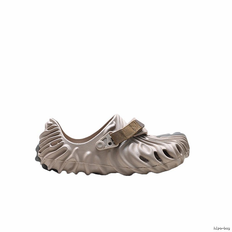 Fashionable beige Crocs clogs