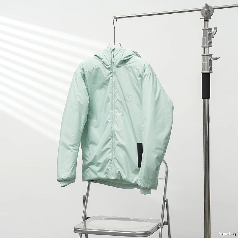 Clean Hooded Profile And Minimal Chest Branding Arc'teryx Lightweight Shell Jacket in Mint Green