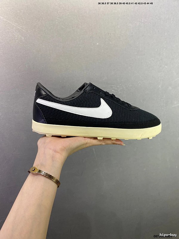 Nike Black and White Waffle-Sole Runners Highlighting Retro Heel Shape